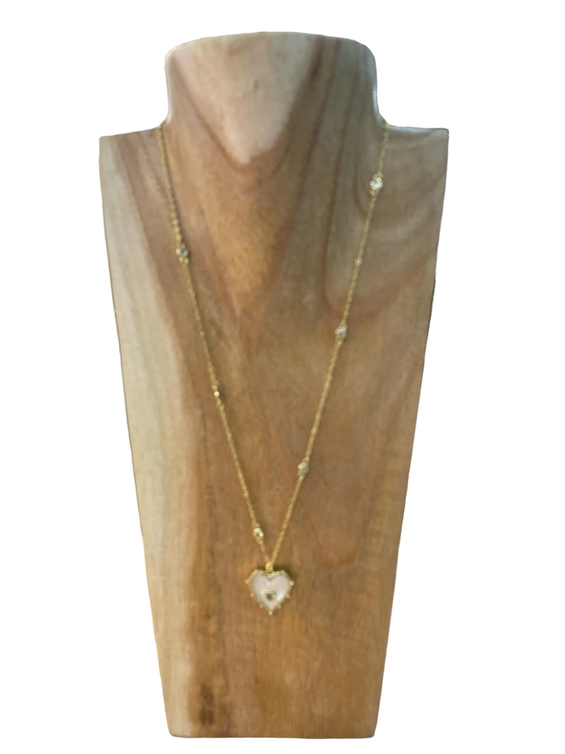 elegante gouden halsketting met hartvormig hanger en kristalaccenten - Sophie Goetsch